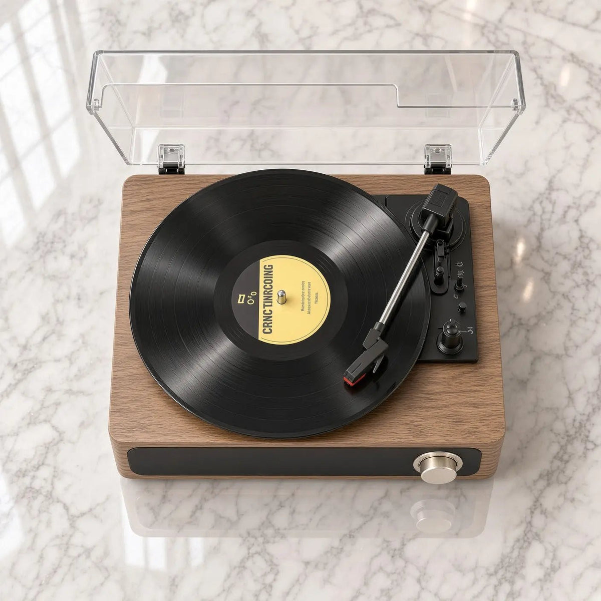 Tocadiscos Nogal visto desde arriba, tapa abierta y vinilo en el plato